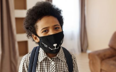 little-boy-wearing-a-face-mask-with-a-design-4261262