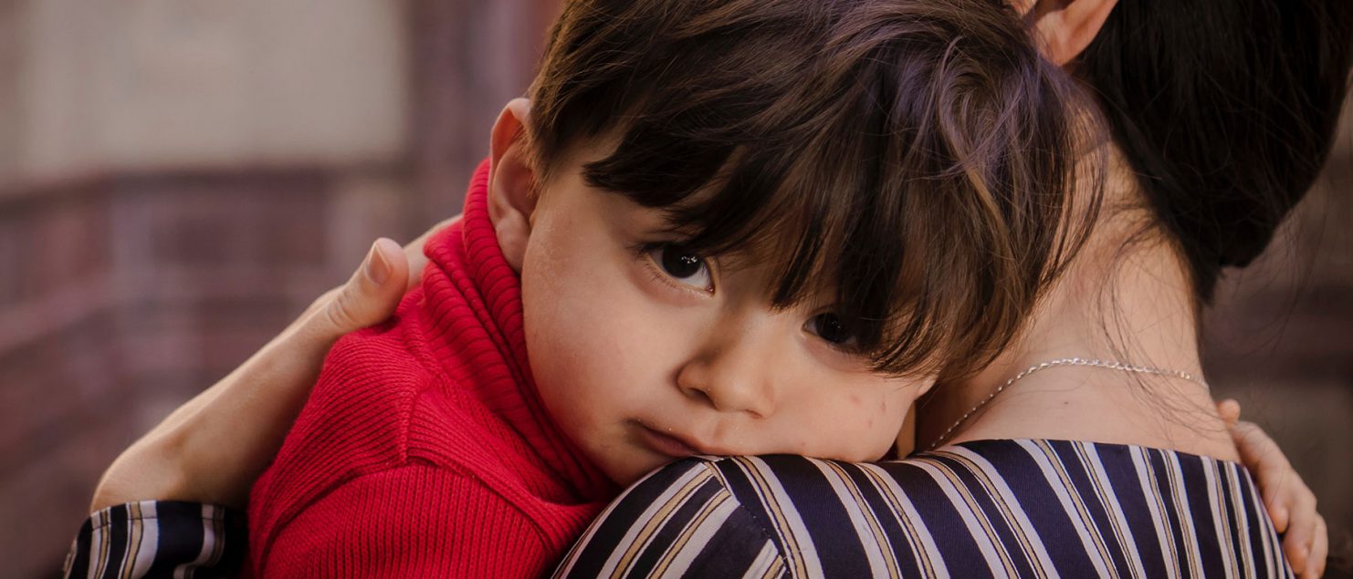Mother hugging her child, palliative care emergencies